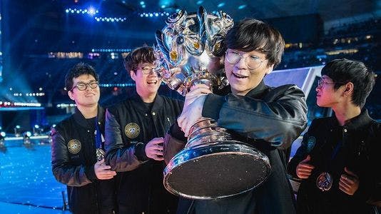 Ruler holding the Worlds trophy