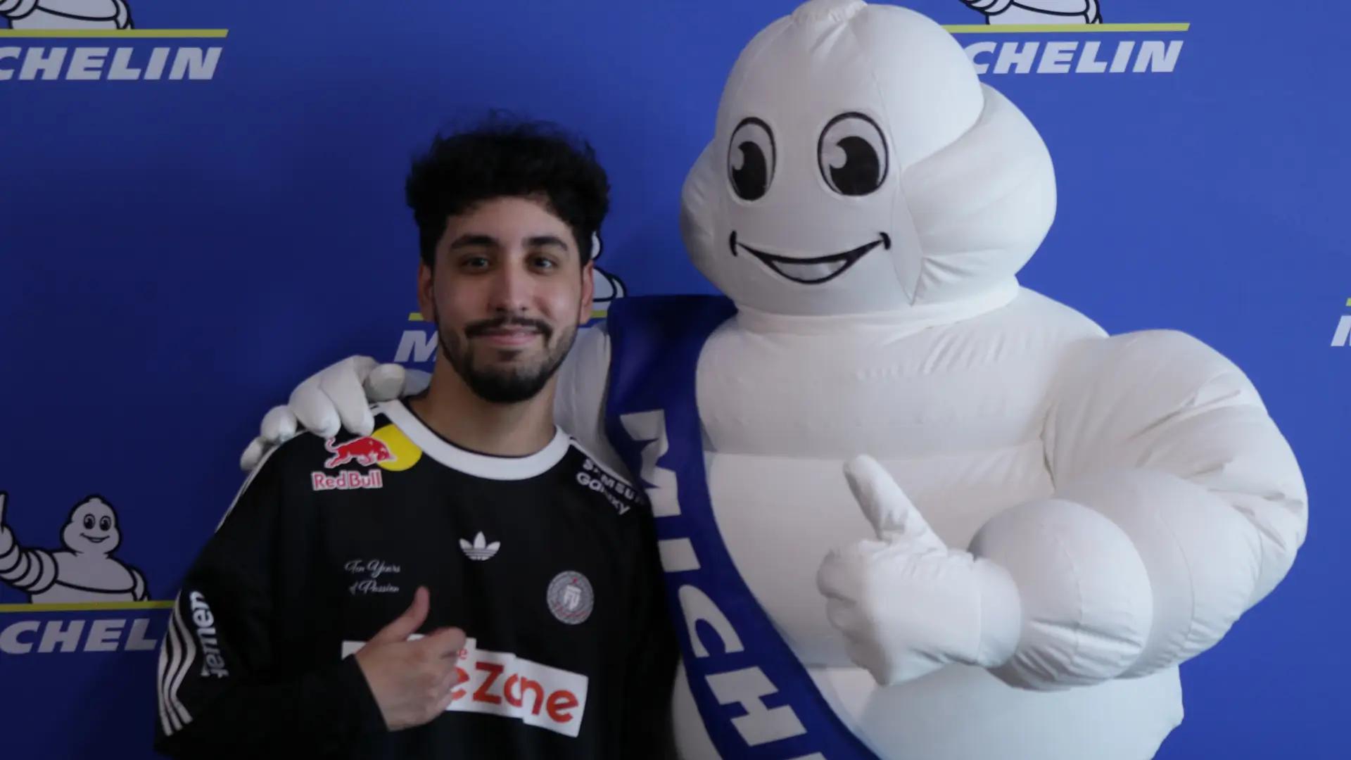 Justin "jstn." Morales and Bibendum at the Michelin booth. Credit: Sheep Esports