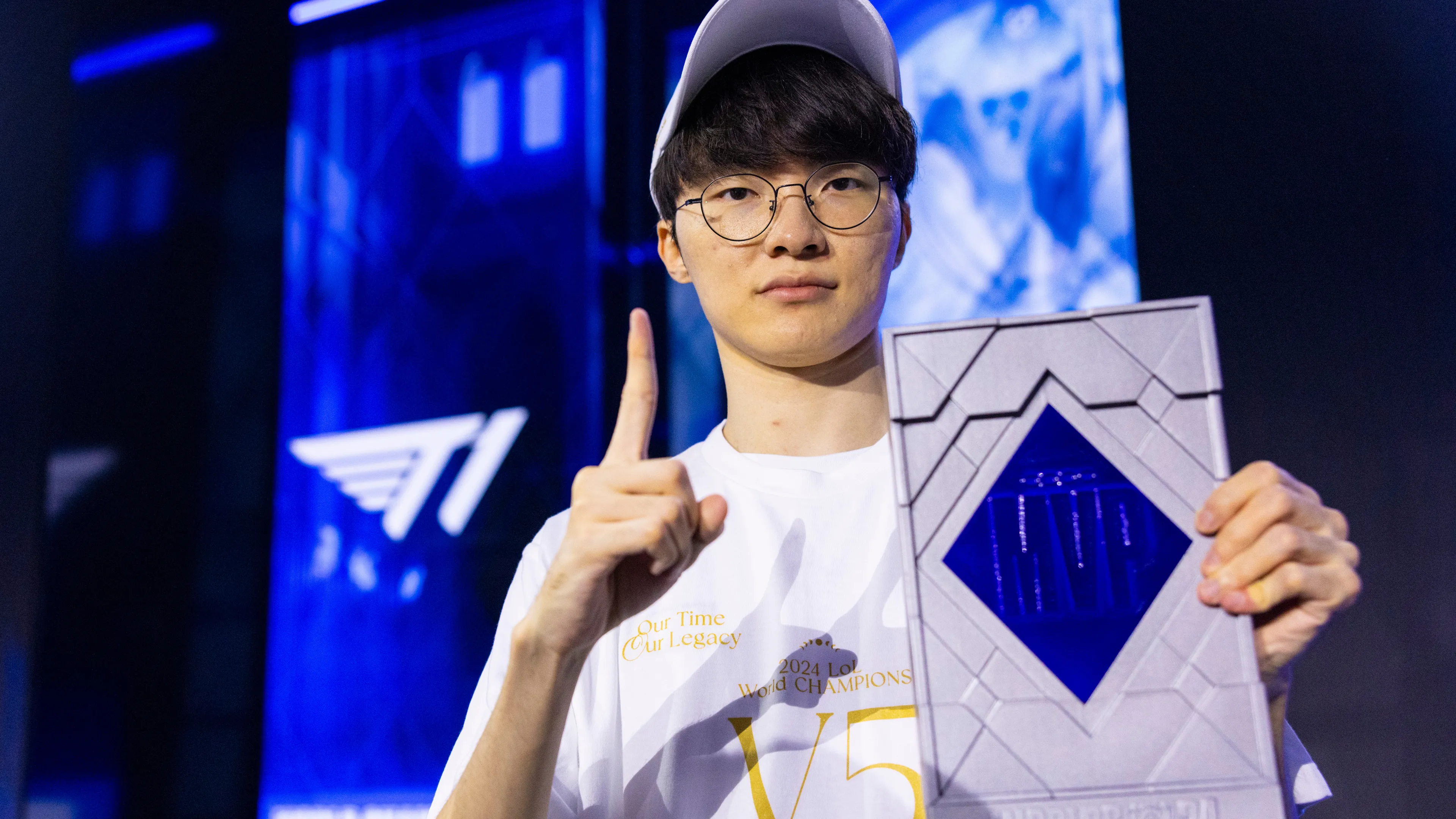 Faker at Worlds 2024 with MVP trophy