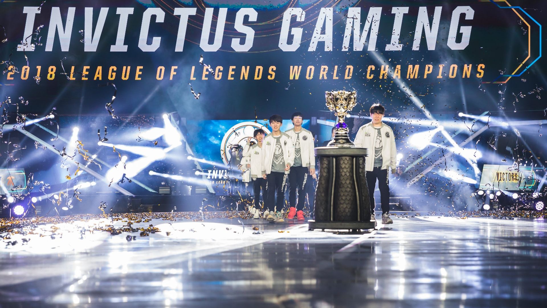 IG step up to claim the Summoner's Cup. Credit: Riot Games