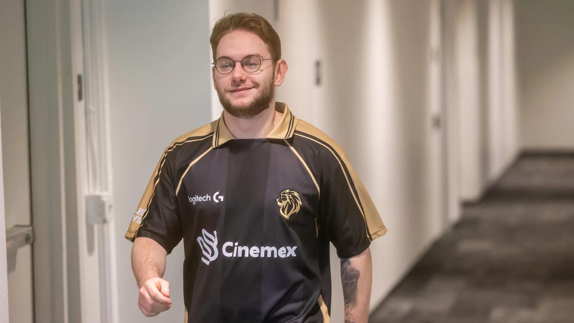 Inspired walks with a grin. Image Credit: Photo by Stefan Wisnoski / Riot Games